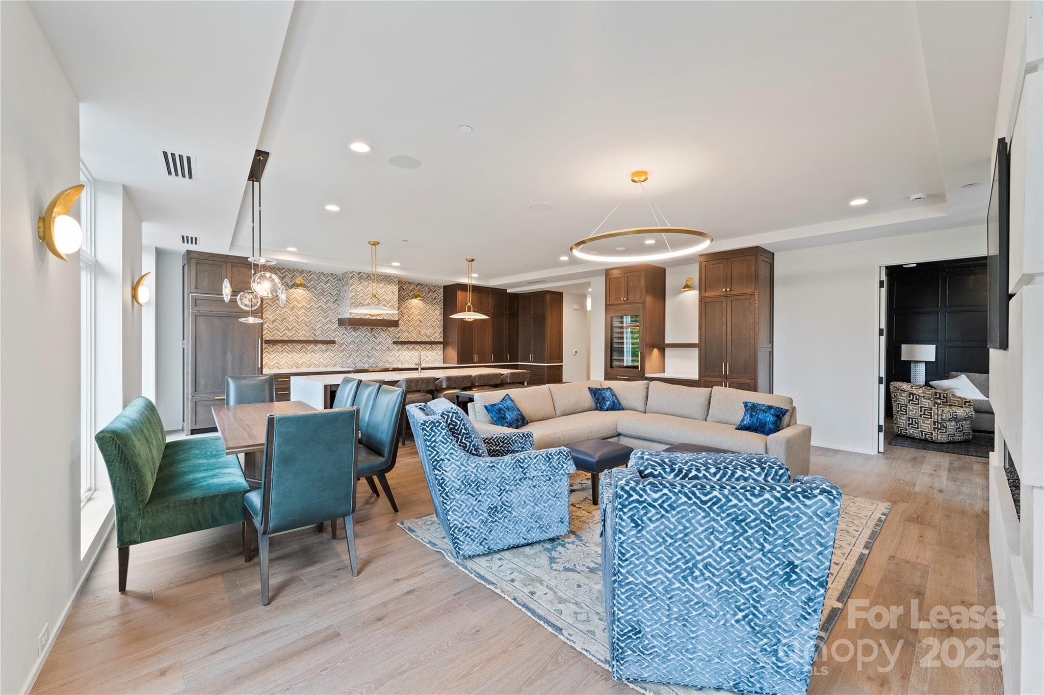 1500 Queens Road, Unit 204 Charlotte, NC 28207 - Photo 25 of 33 a living room with fireplace furniture and a wooden floor