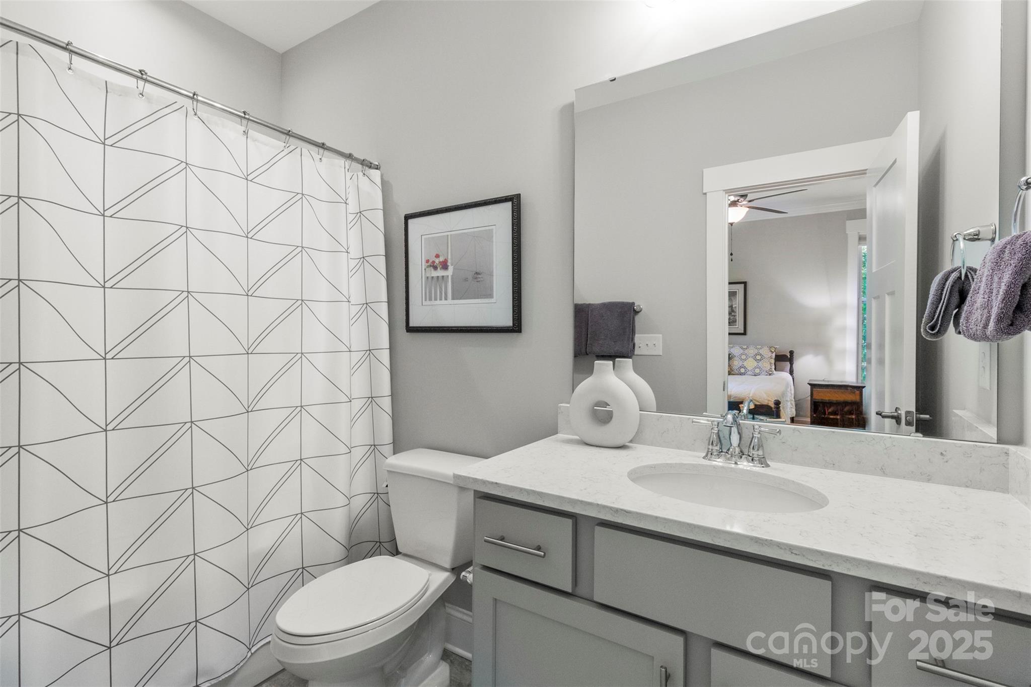 6135 Chimney Bluff Road Lancaster, SC 29720 - Photo 22 of 41 a bathroom with a sink toilet and shower