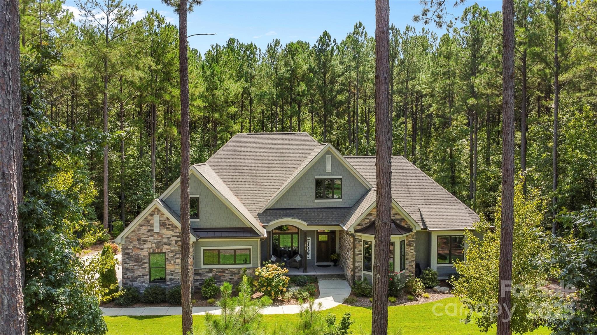 6135 Chimney Bluff Road Lancaster, SC 29720 - Photo 34 of 41 a front view of a house with garden
