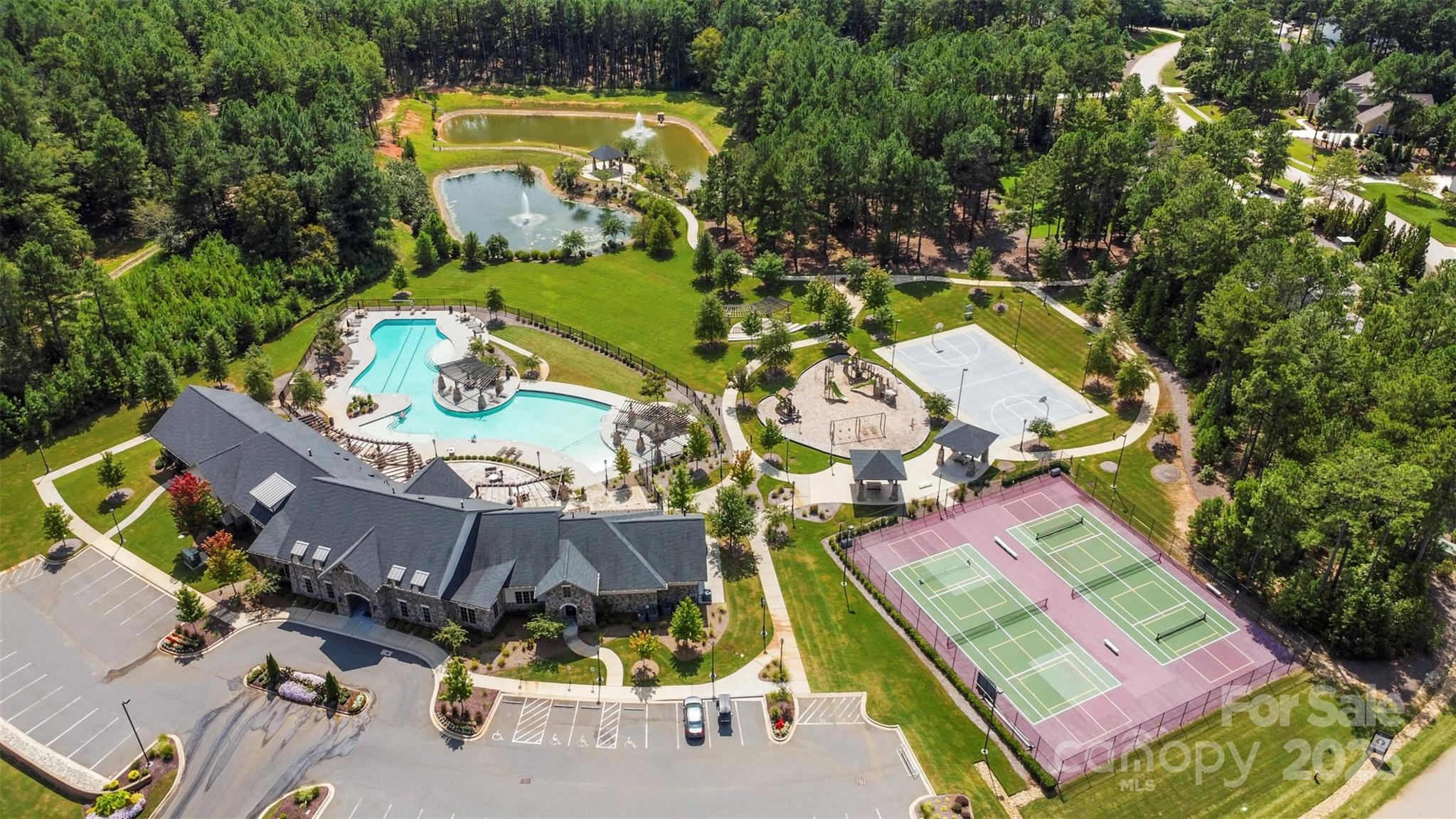 6135 Chimney Bluff Road Lancaster, SC 29720 - Photo 38 of 41 an aerial view of a swimming pool with outdoor seating