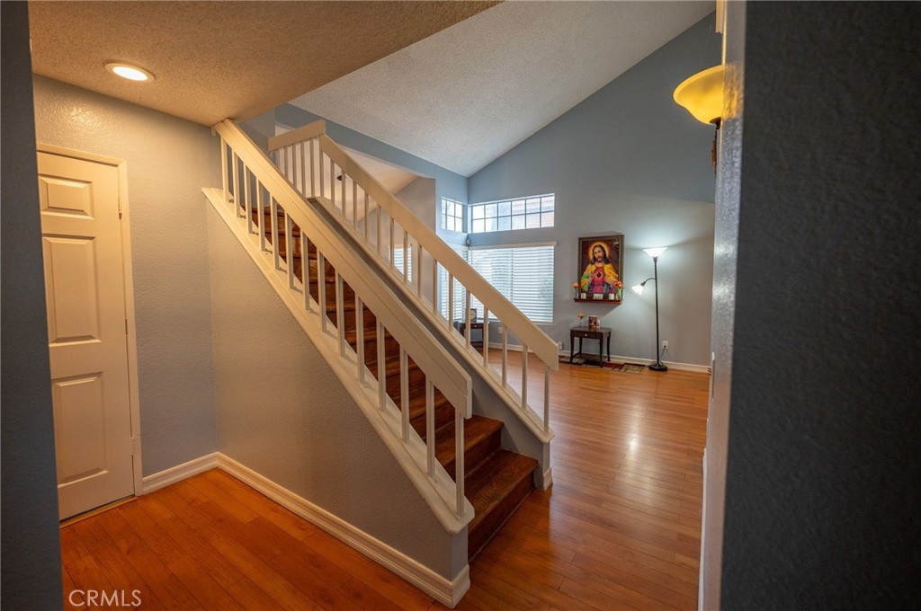 7444 Webster Street Highland, CA 92346 - Photo 18 of 37 a view of entryway and hall with wooden floor