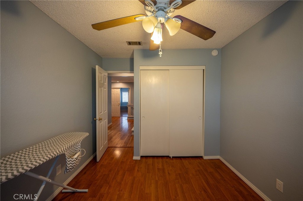 7444 Webster Street Highland, CA 92346 - Photo 20 of 37 a view of an entryway with wooden floor