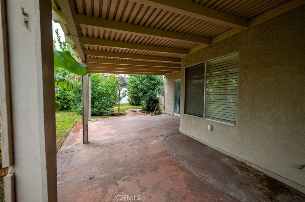 7444 Webster Street Highland, CA 92346 - Photo 31 of 37 a view of a room with a large window and wooden fence