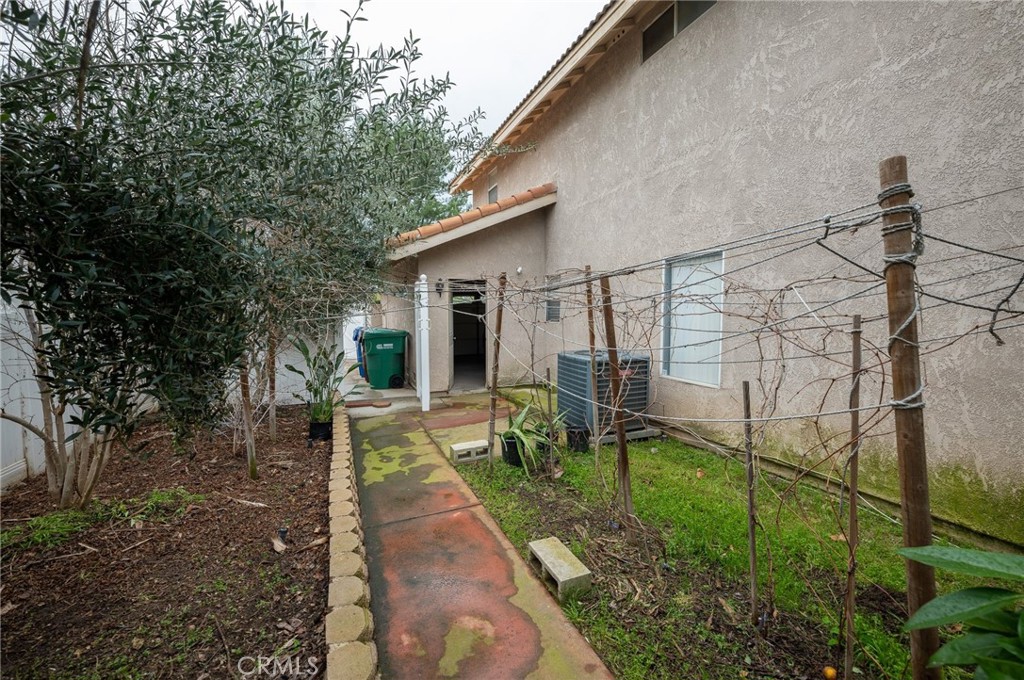 7444 Webster Street Highland, CA 92346 - Photo 33 of 37 a view of a chair and table in backyard of the house