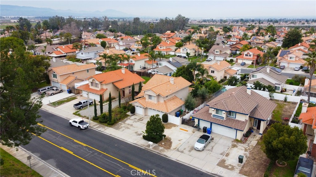 7444 Webster Street Highland, CA 92346 - Photo 37 of 37 an aerial view of residential houses with outdoor space