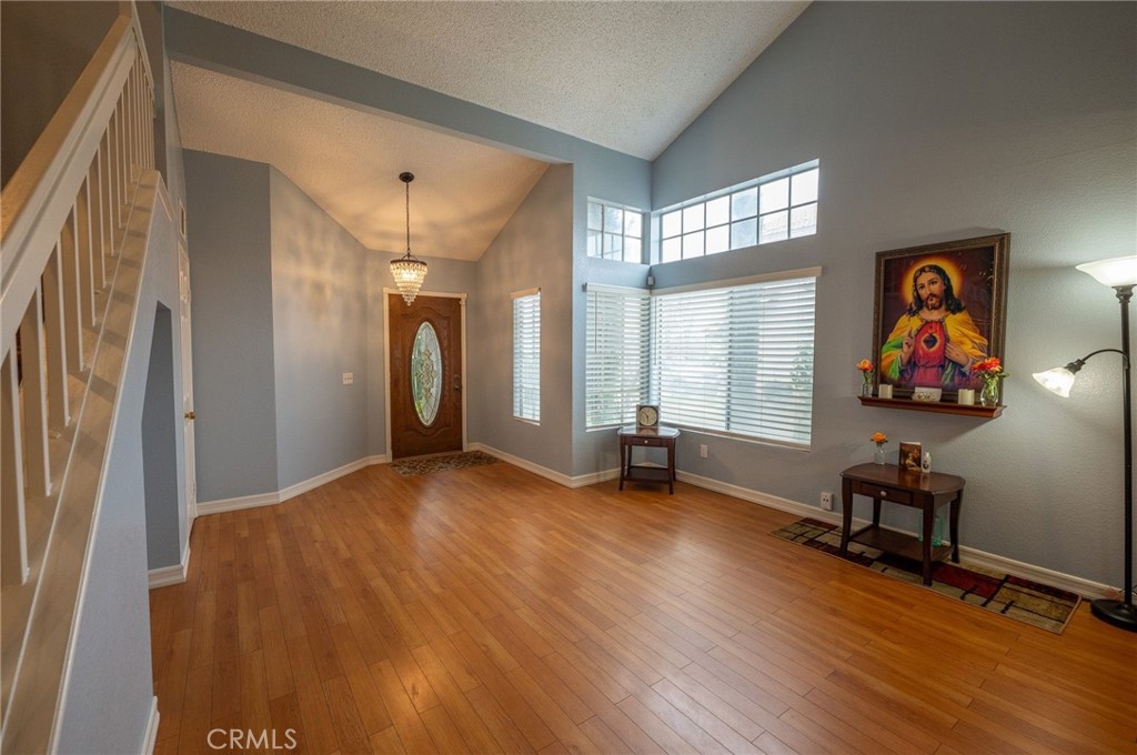 7444 Webster Street Highland, CA 92346 - Photo 5 of 37 a view of a livingroom with wooden floor and a window