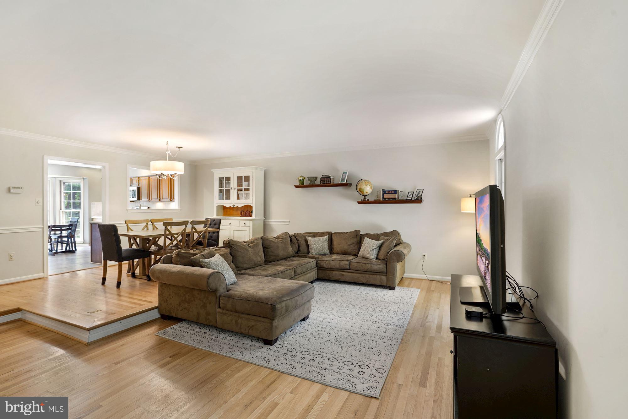 11730 Great Owl Circle Reston, VA 20194 - Photo 3 of 35 Living Room open to Dining Room