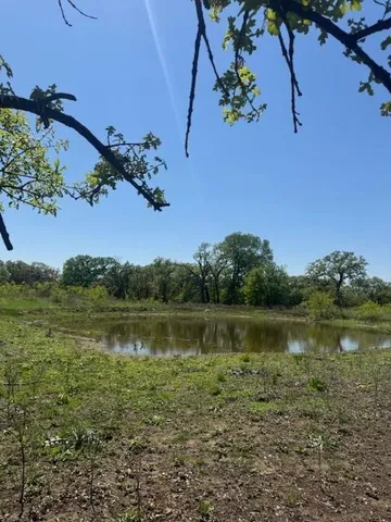 a view of a lake with a mountain in the background