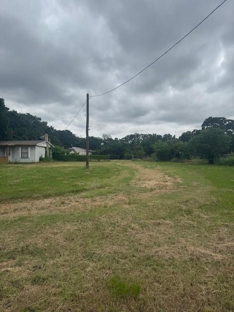 6355 Newt Patterson Road, Unit A Mansfield, TX 76063 - Photo 25 of 27 a view of a garden with a chair