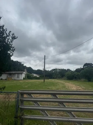 a view of a golf course with a lake