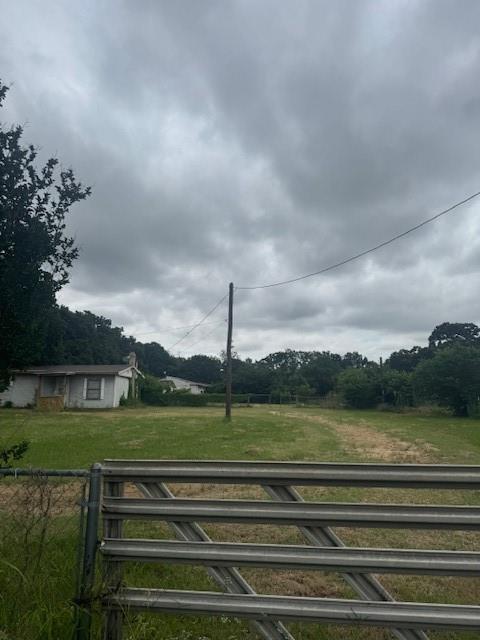 6355 Newt Patterson Road, Unit A Mansfield, TX 76063 - Photo 26 of 27 a view of a golf course with a lake
