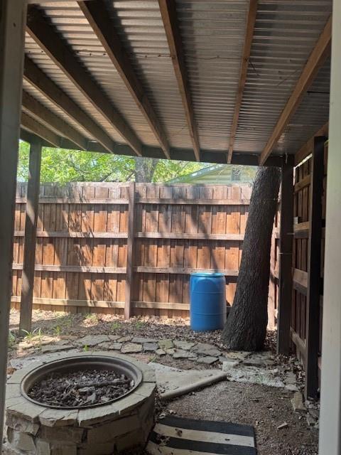 6355 Newt Patterson Road, Unit A Mansfield, TX 76063 - Photo 27 of 27 a view of potted plants next to a building