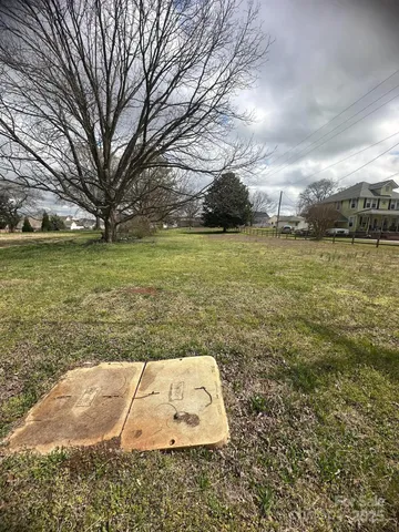 a view of a yard with an outdoor space