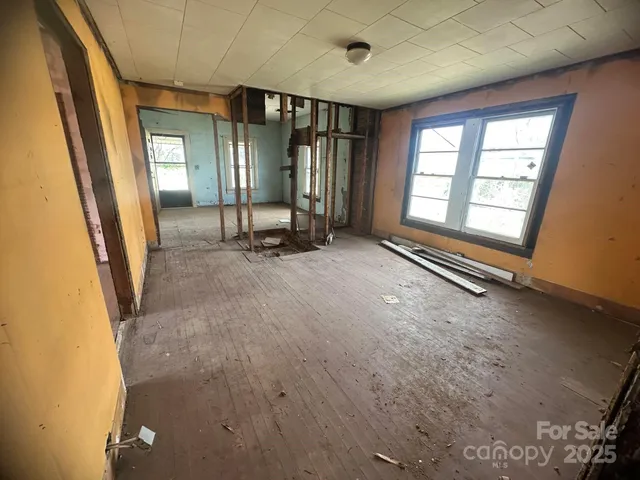 a view of a room with windows