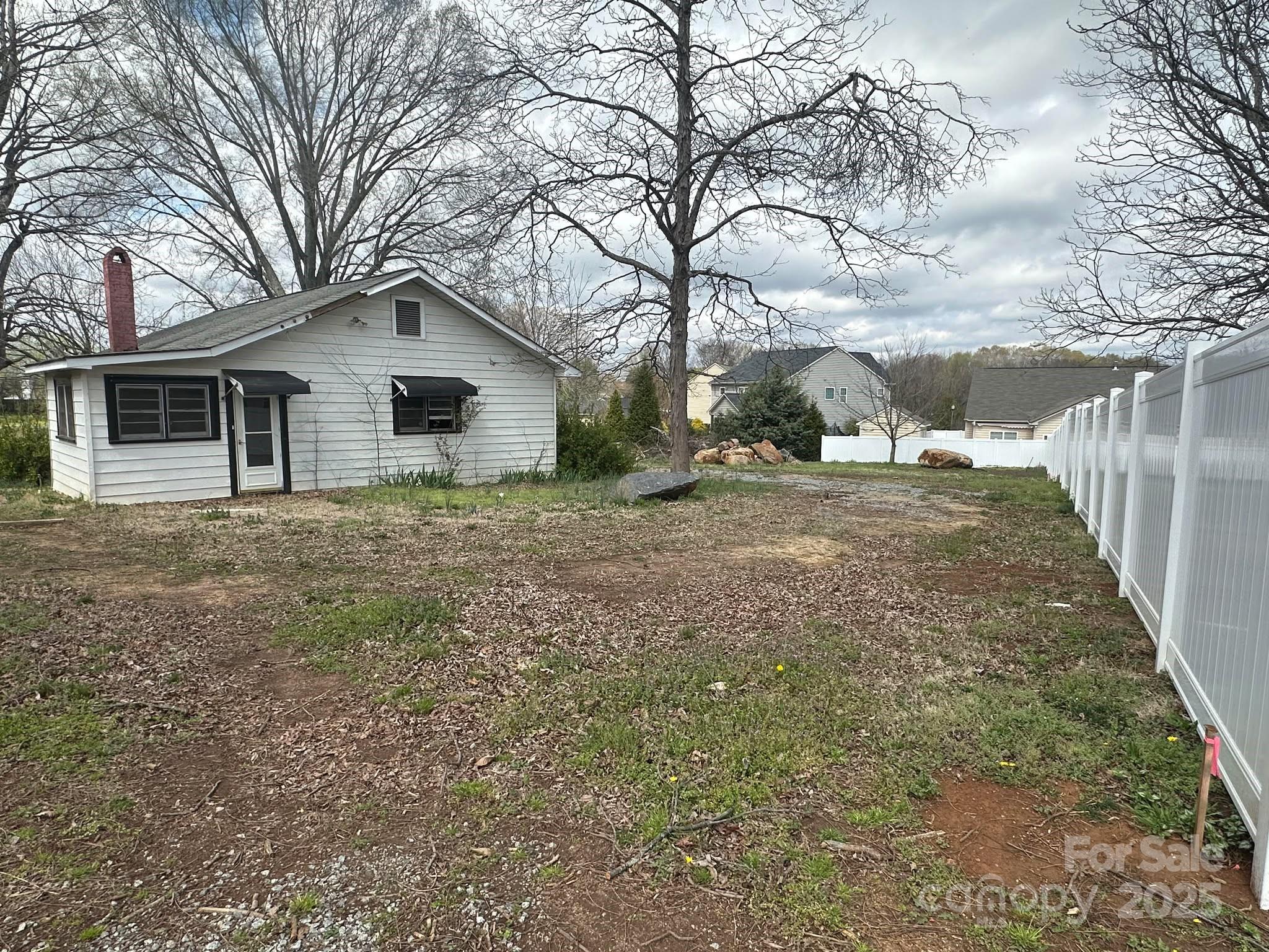 4349 Roberta Road Concord, NC 28027 - Photo 6 of 25 a house with trees in front of it