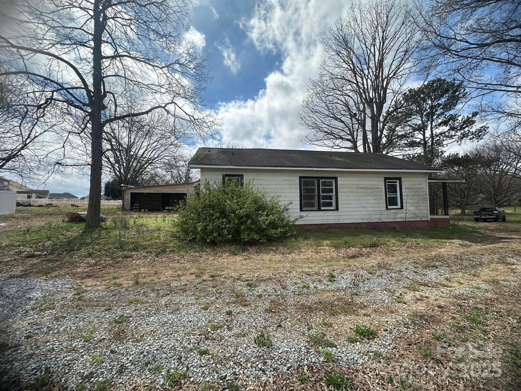 4349 Roberta Road Concord, NC 28027 - Photo 9 of 25 a view of a house with a yard