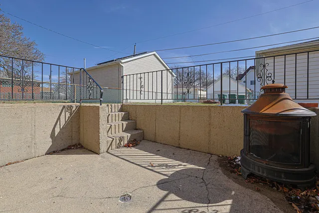 a view of a room with wooden floor and windows