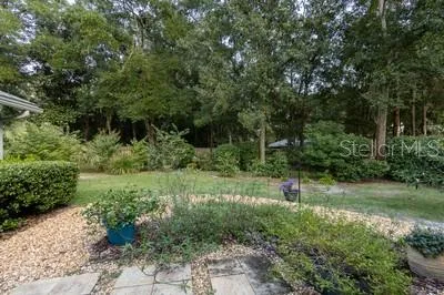 a view of backyard with green space