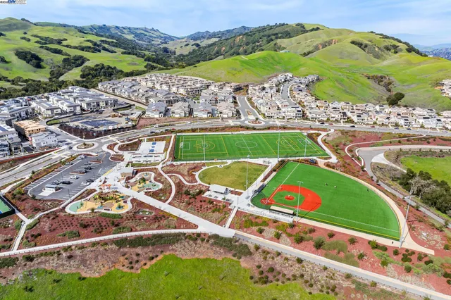a view of a balcony with furniture