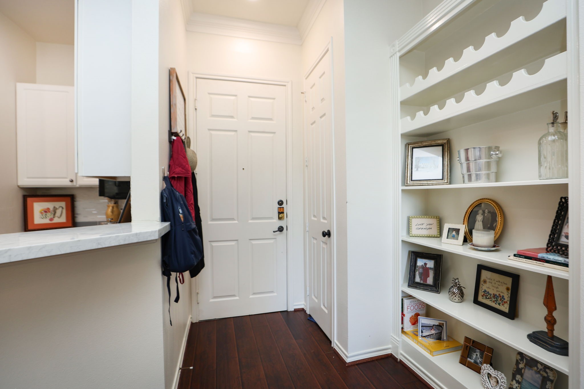 2400 South McCue Road, Unit 104 Houston, TX 77056 - Photo 17 of 38 View from living room facing entry from hallway.