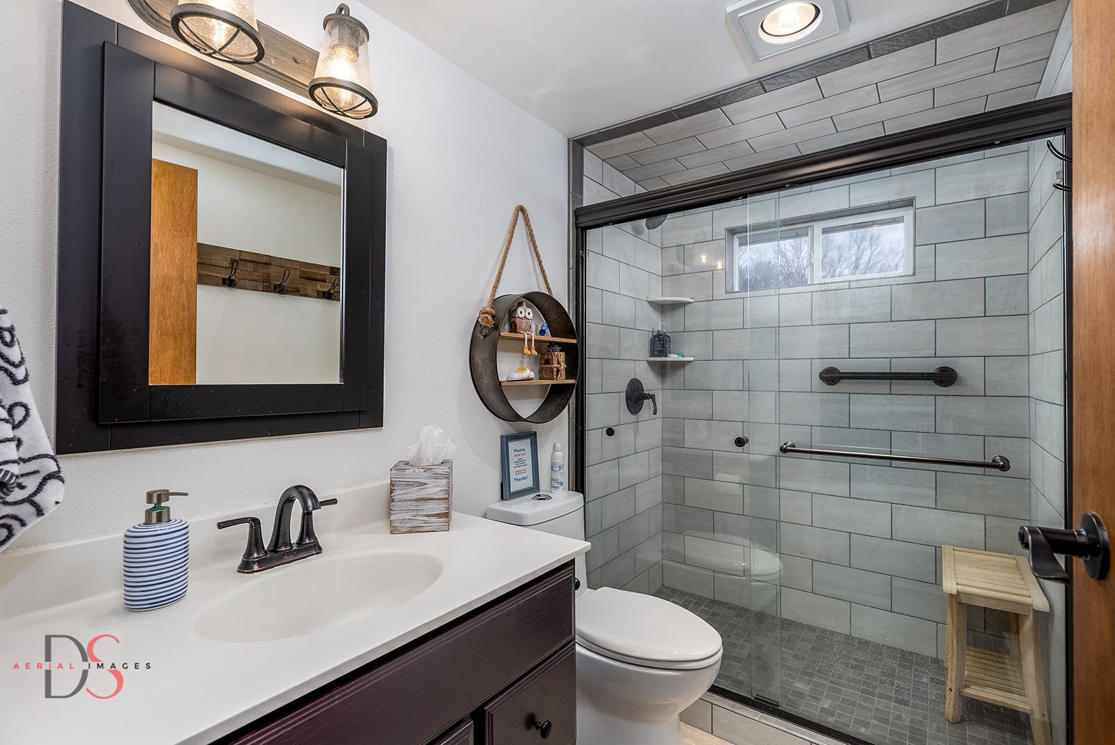 152 Beachview Court Varna, IL 61375 - Photo 17 of 46 a bathroom with a granite countertop sink mirror toilet and shower