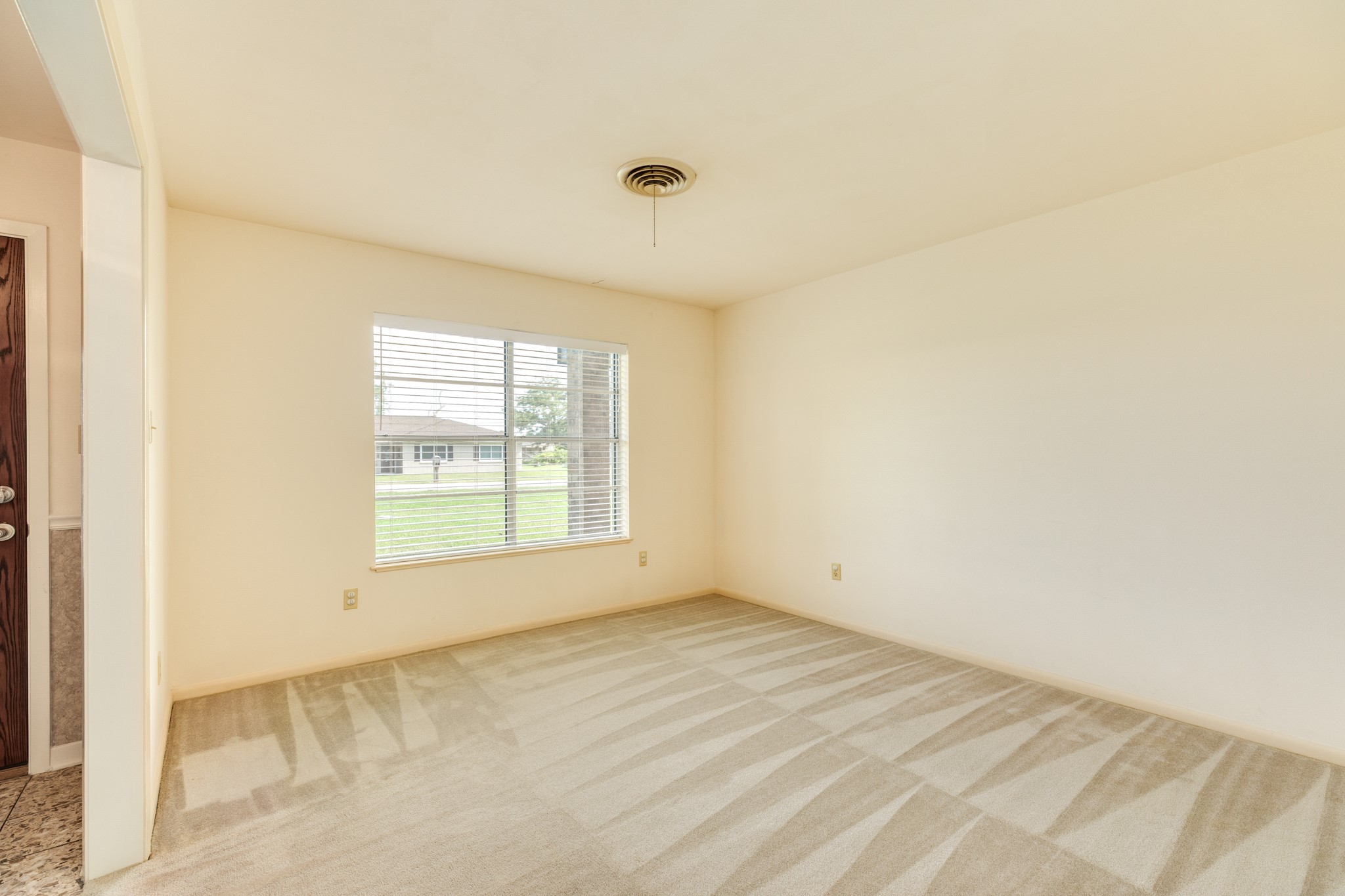 232 Magnolia Street Brazoria, TX 77422 - Photo 13 of 28 a view of an empty room with a window