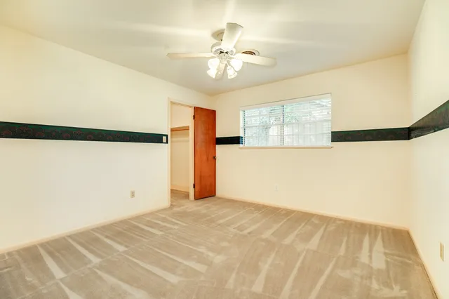 a view of a room with a window