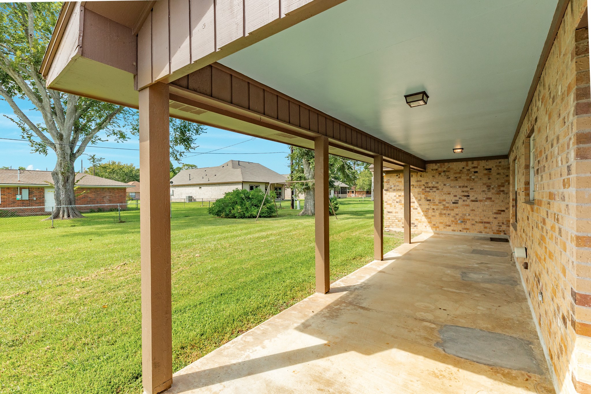 232 Magnolia Street Brazoria, TX 77422 - Photo 27 of 28 a view of a porch and garden