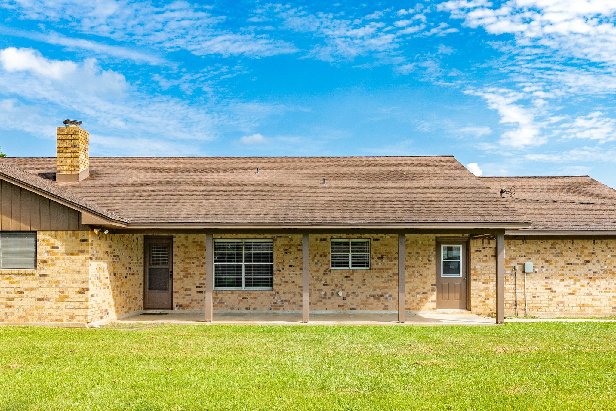 232 Magnolia Street Brazoria, TX 77422 - Photo 28 of 28 a front view of a house with a yard