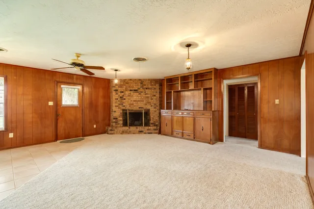 a view of a livingroom with a fireplace