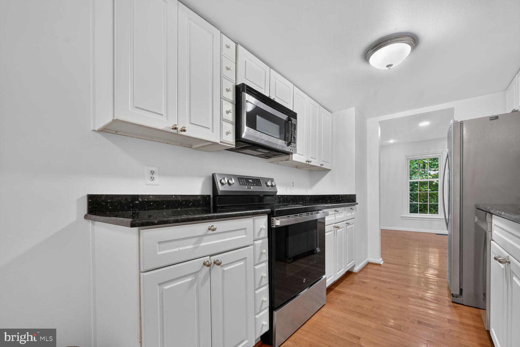 7328 Greentree Road Bethesda, MD 20817 - Photo 5 of 38 Eat-in Kitchen w/ Granite Counters & SS Appliances