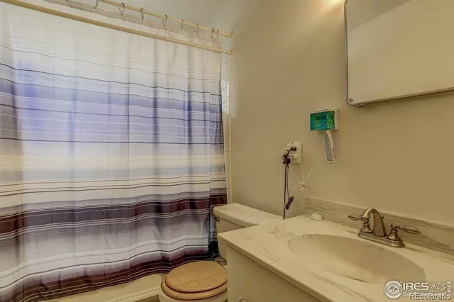 a kitchen with stainless steel appliances a refrigerator and a stove