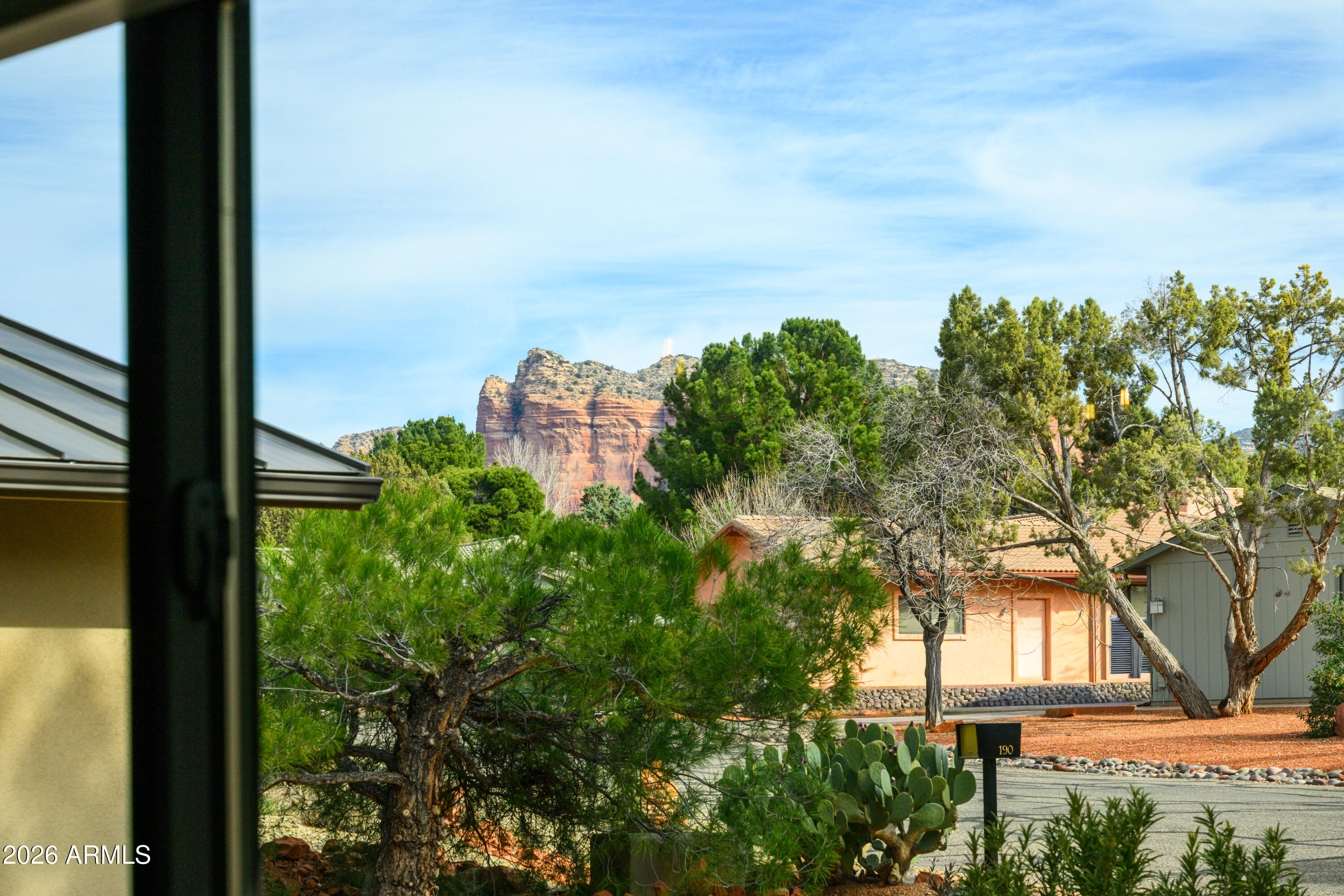190 Creek Rock Road Sedona, AZ 86351 - Photo 6 of 41 a view of a yard in front of a building