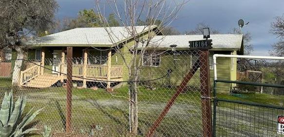 16164 Nugget Road Corning, CA 96021 - Photo 2 of 53 an aerial view of a house with swimming pool
