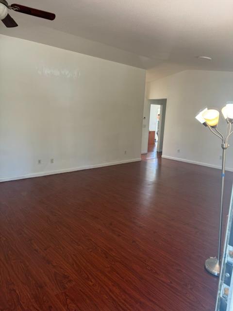 16164 Nugget Road Corning, CA 96021 - Photo 34 of 53 an empty room with wooden floor and windows