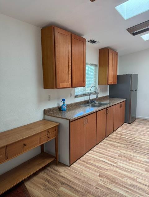 16164 Nugget Road Corning, CA 96021 - Photo 42 of 53 a kitchen with stainless steel appliances granite countertop a sink and cabinets