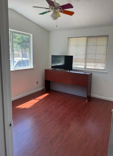 16164 Nugget Road Corning, CA 96021 - Photo 47 of 53 a living room with furniture and a wooden floor