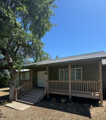 16164 Nugget Road Corning, CA 96021 - Photo 7 of 53 a view of a house with a deck