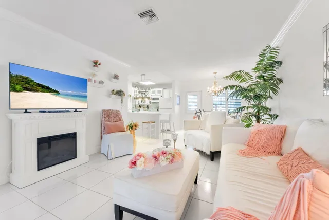 a bedroom with furniture and a fireplace