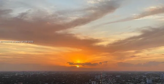 a view of city and mountain