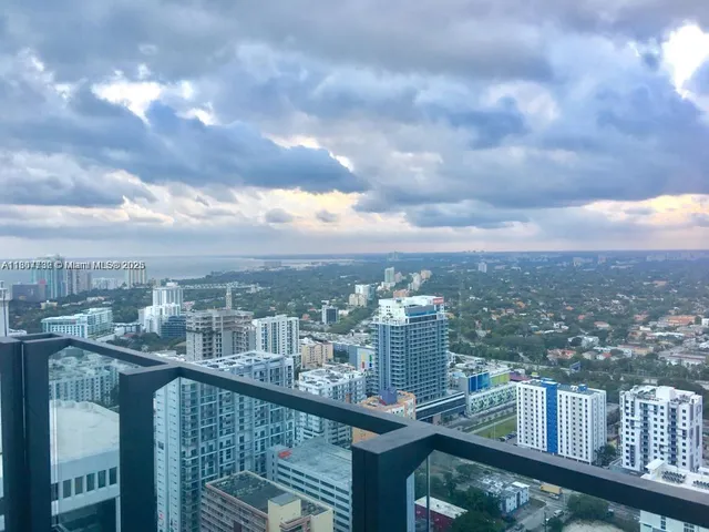 a view of a city from a balcony