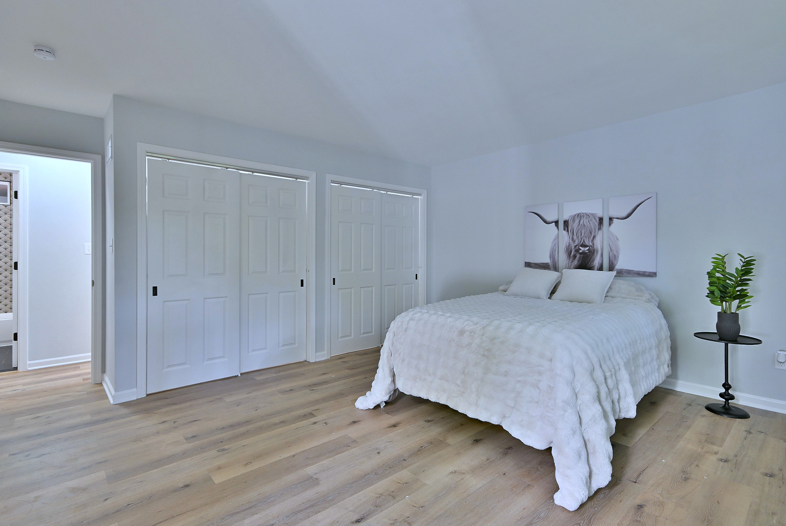 1605 Middletree Road Joliet, IL 60433 - Photo 15 of 44 a bedroom with a bed and wooden floor