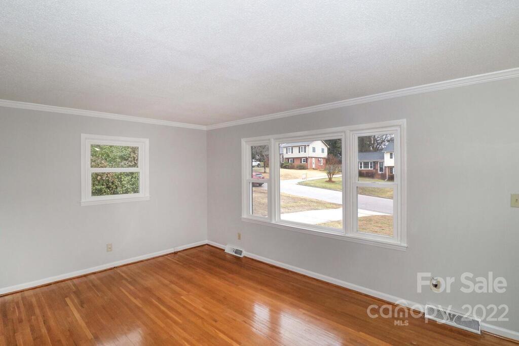 408 Ashbrook Road Salisbury, NC 28147 - Photo 4 of 48 a view of an empty room with a window