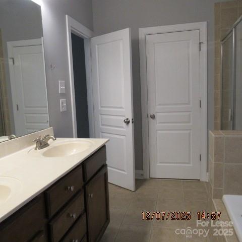 8520 Dargan Lane Waxhaw, NC 28173 - Photo 14 of 19 a bathroom with a sink and a mirror