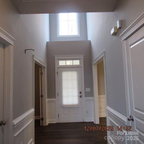 8520 Dargan Lane Waxhaw, NC 28173 - Photo 3 of 19 a view of an empty room with wooden floor and a window