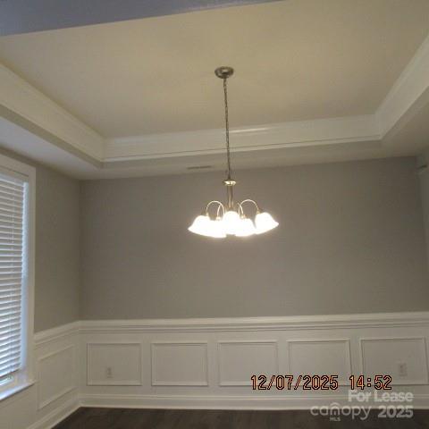 8520 Dargan Lane Waxhaw, NC 28173 - Photo 7 of 19 a view of a chandelier fan and wooden floor