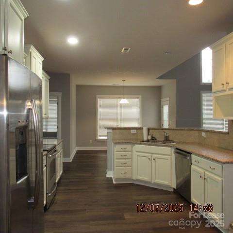 8520 Dargan Lane Waxhaw, NC 28173 - Photo 9 of 19 a kitchen with stainless steel appliances granite countertop a sink stove and refrigerator