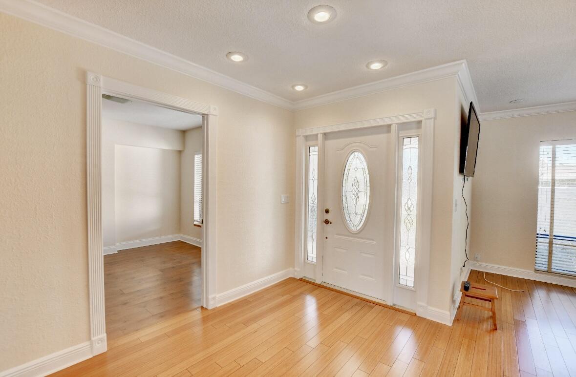 17768 Maplewood Drive Boca Raton, FL 33487 - Photo 12 of 50 a view of room with window and wooden floor