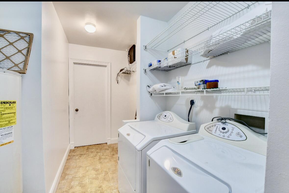 17768 Maplewood Drive Boca Raton, FL 33487 - Photo 17 of 50 a utility room with dryer and washer