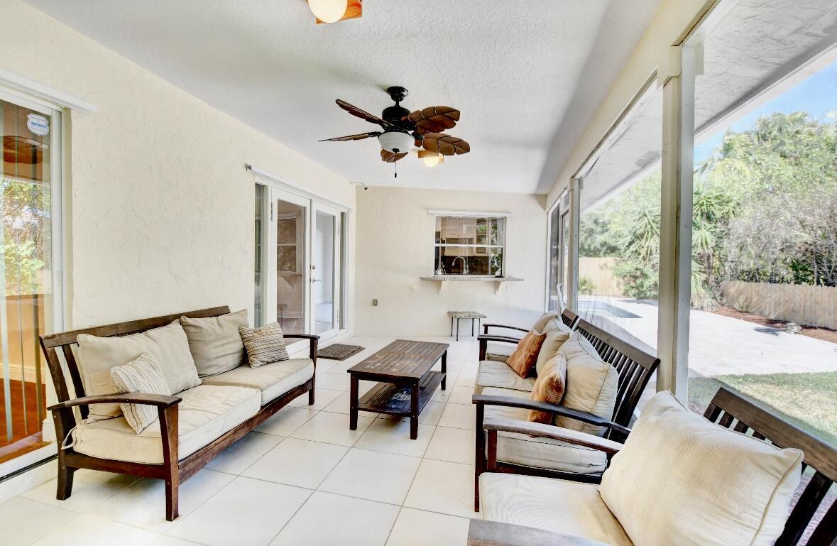 17768 Maplewood Drive Boca Raton, FL 33487 - Photo 37 of 50 a living room with furniture and a window